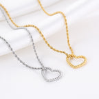 Amorélia – Zilveren en gouden Hart Ketting – Stainless Steel Close Up