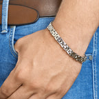 Close-up van koningsschakel armband in zilverkleurig stainless steel - City Juwelier