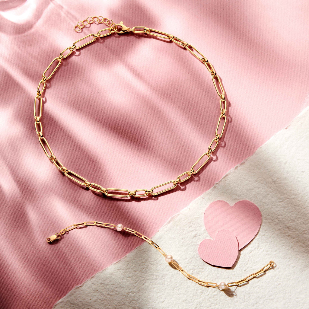 Geelgouden dames armband met karabijnsluiting en parels - City Juwelier